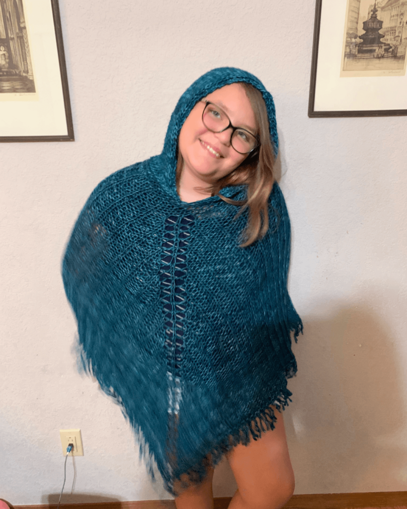 Earthling Free knit poncho pattern by Drops Design