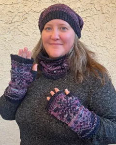 Lois Silva of OzzyLosi Knit Designs in Snow Celebration pattern set includes Snowy Caps beanie, Snowflake Love cowl, and M'its Snowing! fingerless mitts.