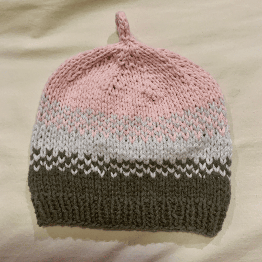 Golden pear free baby knit hat pattern by Sweet Fiber